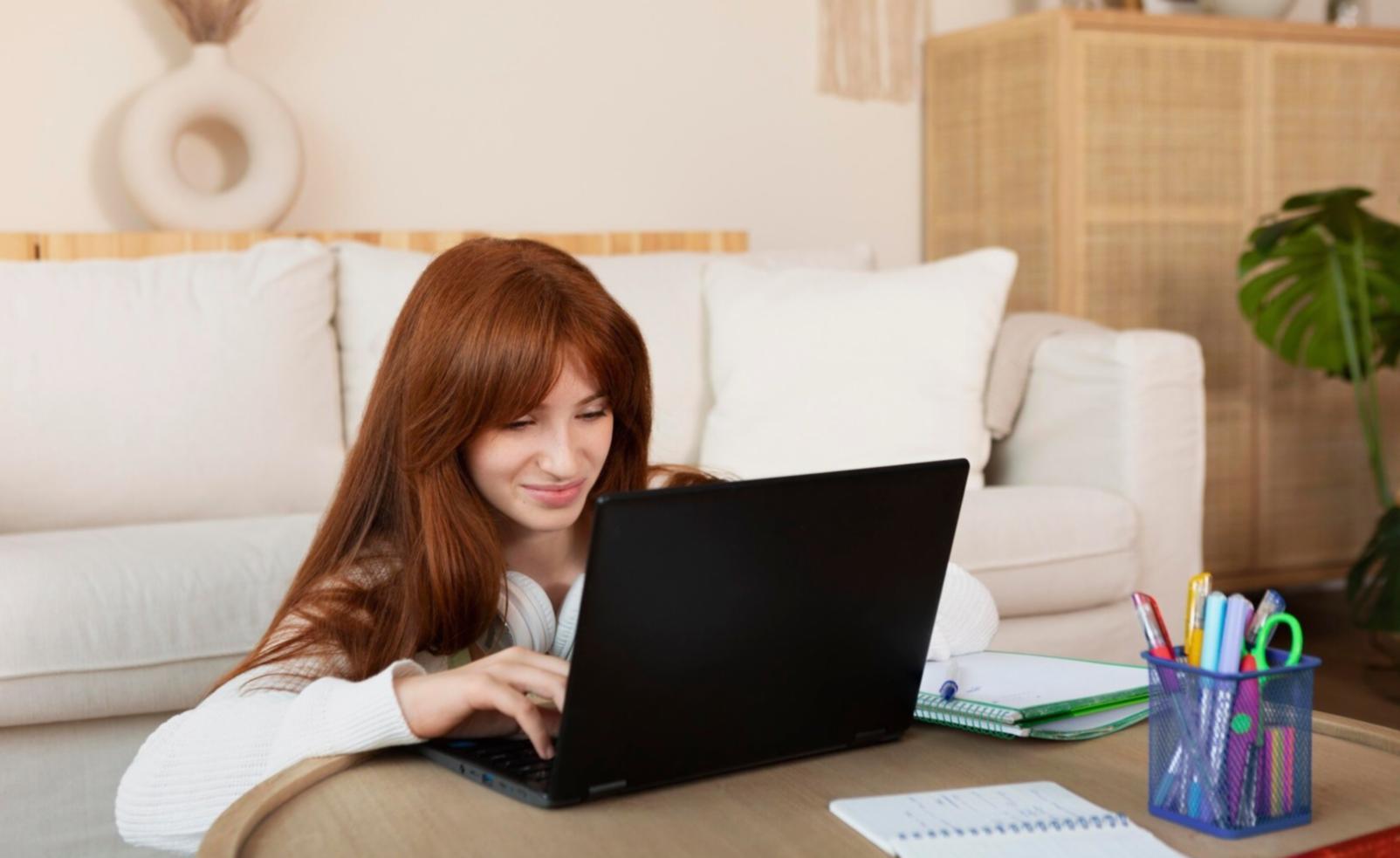 Instructor demonstrating bug tracking techniques on computer screen to engaged students